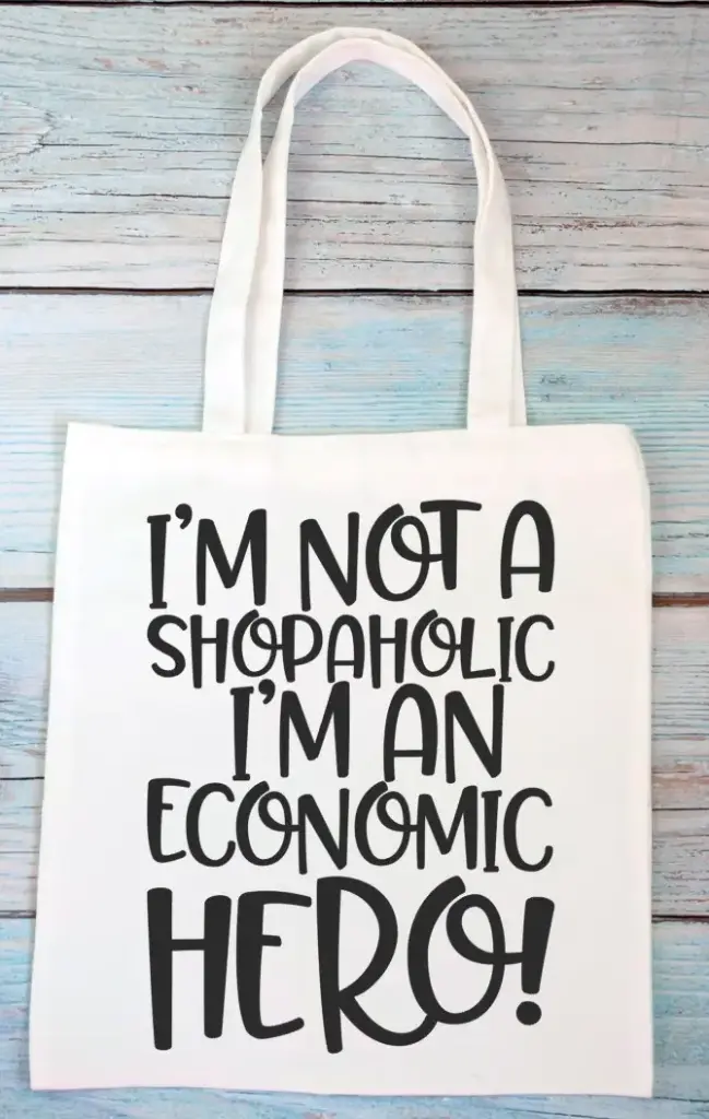 I'm not a shopaholic, i'm an economic hero! (Zwart)